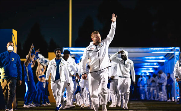 Rams Coach Sean McVay leads his team in a pep rally.