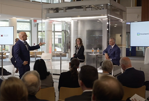 Miami University President Gregory Crawford speaks at an event with Cleveland Clinic