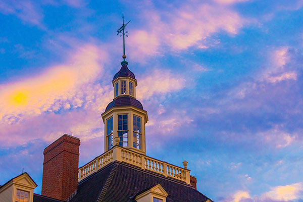 colorful clouds above the cupola of Harrison Hall
