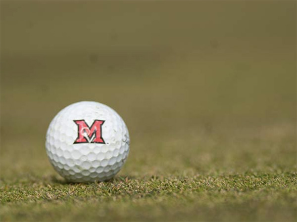 golf ball with a "Miami" M 