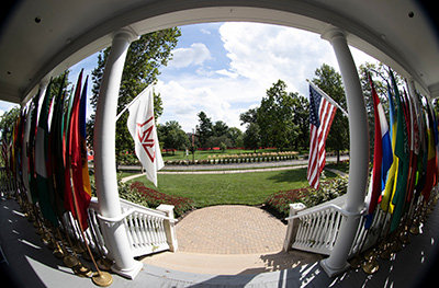 flags of many countries on porch of lewis place