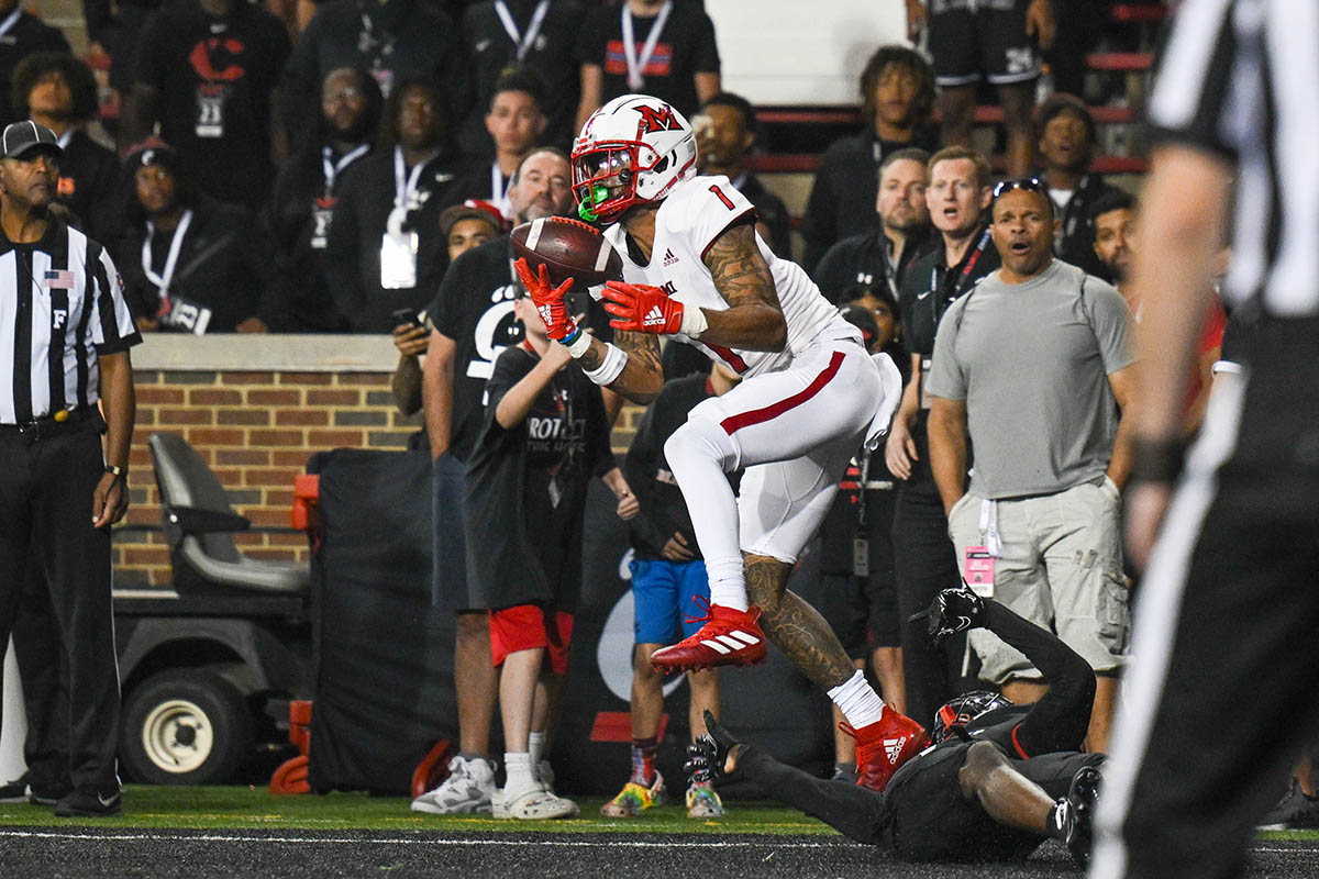 Miami's Joe Wilkins Jr. scores the winning touchdown against Cincinnati 