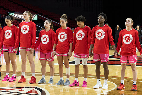 Miami University women's basketball players prepare for the start of their Love.Honor.Care game