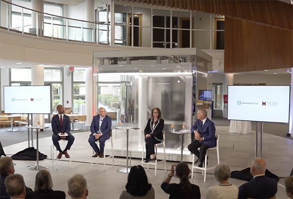Miami University President Gregory Crawford speaks at an event with Cleveland Clinic