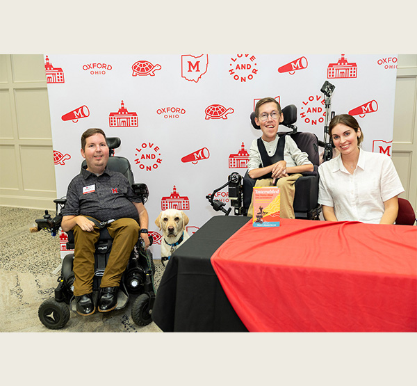 Dan Darkow with the influencer Shane Burcaw, who along with his wife, Hannah Burcaw, are known to their 634,000 social media followers as “Squirmy and Grubs.” 