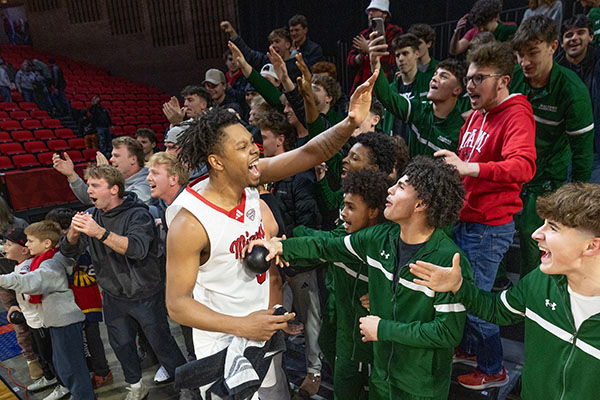 Miami University men's basketball celebrates a recent victory