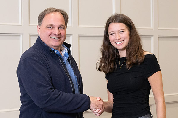 Douglas Coffin, left, and Miami University student Julia Hall