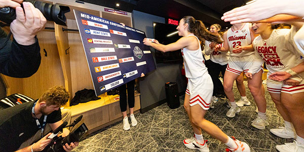 The Miami University women's basketball team celebrates 