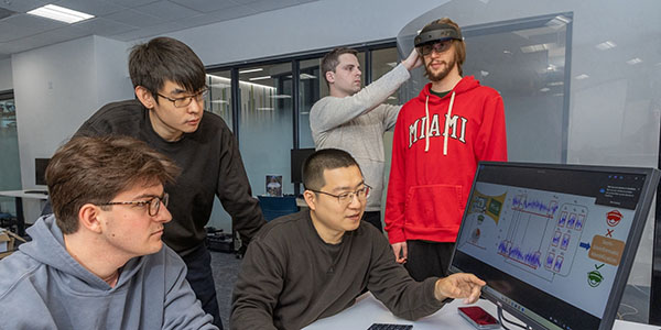 Miami university students Ian Dewey, Zhaowen Chen, Camden Amata, and Evan Patterson with professor Xianglong Feng