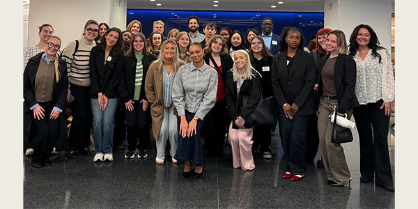 Career Academy participants pose for a picture during a visit to IBM