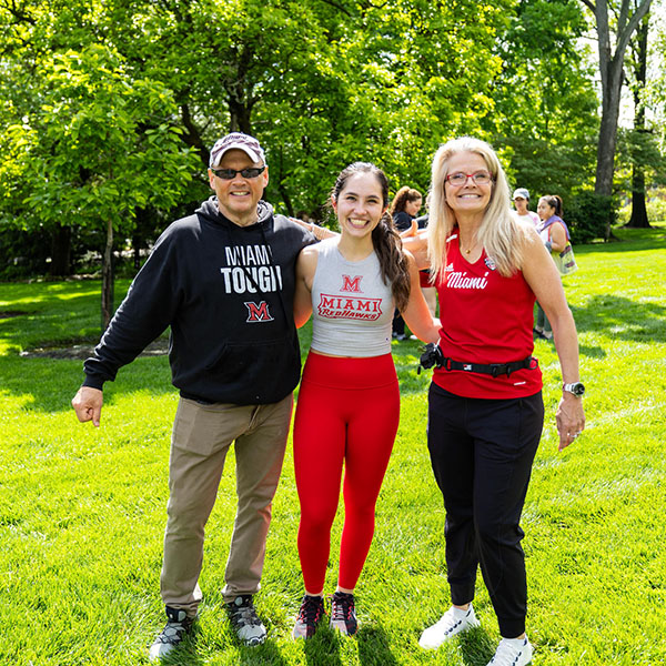 Miami University President Gregory Crawford, left, Bridget Stafford, and University Ambassador Dr. Renate Crawford